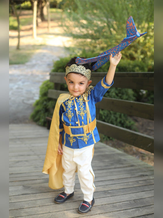 Prince Charming blue costume for boys, featuring a regal blue jacket with gold trim and matching pants. Ideal for costume parties or dress-up play, this outfit captures the classic fairytale look with elegant details.