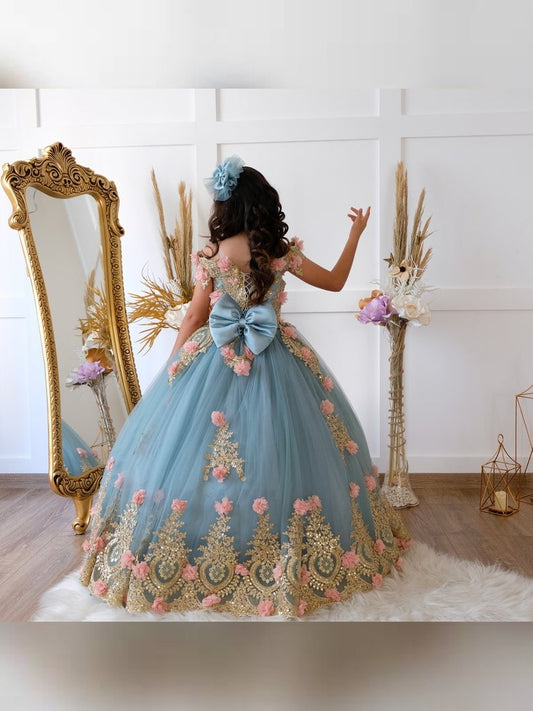 Our quinceanera dresses have a very elegant and royal look. The fluted skirt makes this dress so dreamy and elegant. The lace accented bodice and skirt is so gorgeous with the long train. You will be beautiful in this gorgeous gown. This gown with lot of 3d flowers will make you feel like a queen on your most special day.