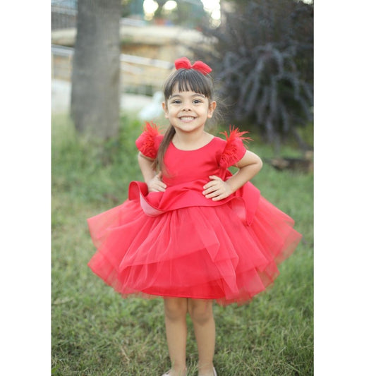 Elegant red flower girl dress made of cotton, tulle, and satin, perfect for weddings and special occasions.