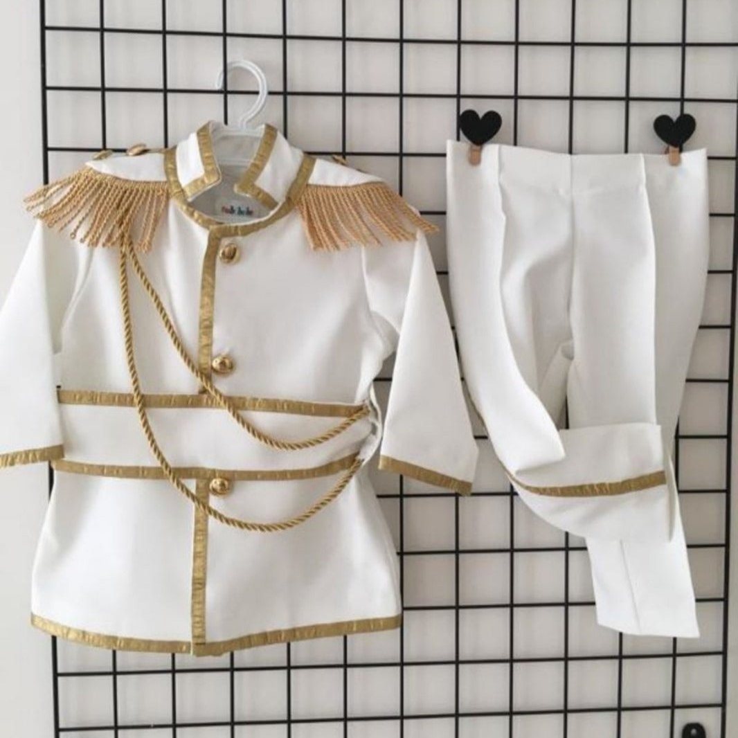 Close-up of the tuxedo jacket and bow tie – This Prince White Charming Suit highlights intricate tailoring with clean lines, a sharp lapel, and a crisp bow tie, offering a distinguished look for young boys at formal events such as weddings or christenings. Baby Girl Dress