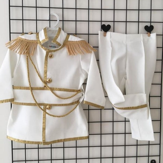 Close-up of the tuxedo jacket and bow tie – This Prince White Charming Suit highlights intricate tailoring with clean lines, a sharp lapel, and a crisp bow tie, offering a distinguished look for young boys at formal events such as weddings or christenings. Baby Girl Dress