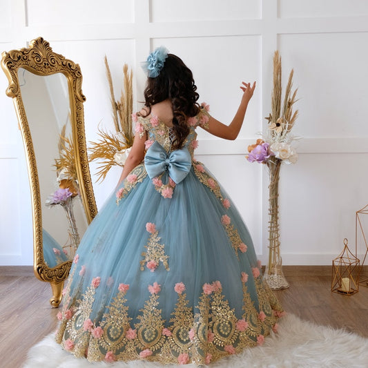 Our quinceanera dresses have a very elegant and royal look. The fluted skirt makes this dress so dreamy and elegant. The lace accented bodice  and skirt is so gorgeous with the long train. You will be beautiful in this gorgeous gown. This gown with lot of 3d flowers will make you feel like a queen on your most special day.