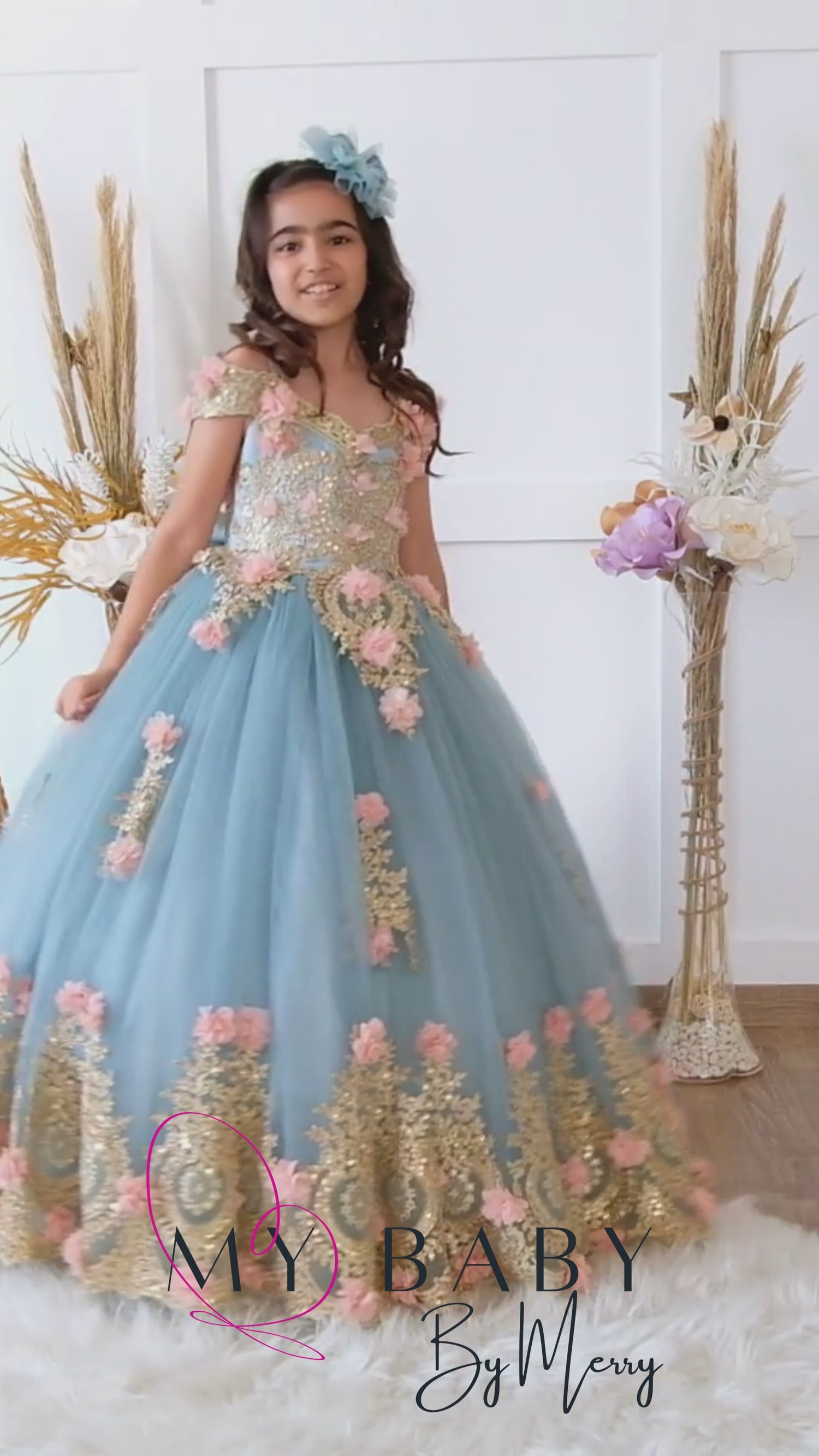 Our quinceanera dresses have a very elegant and royal look. The fluted skirt makes this dress so dreamy and elegant. The lace accented bodice  and skirt is so gorgeous with the long train. You will be beautiful in this gorgeous gown. This gown with lot of 3d flowers will make you feel like a queen on your most special day. Baby Girl Dress