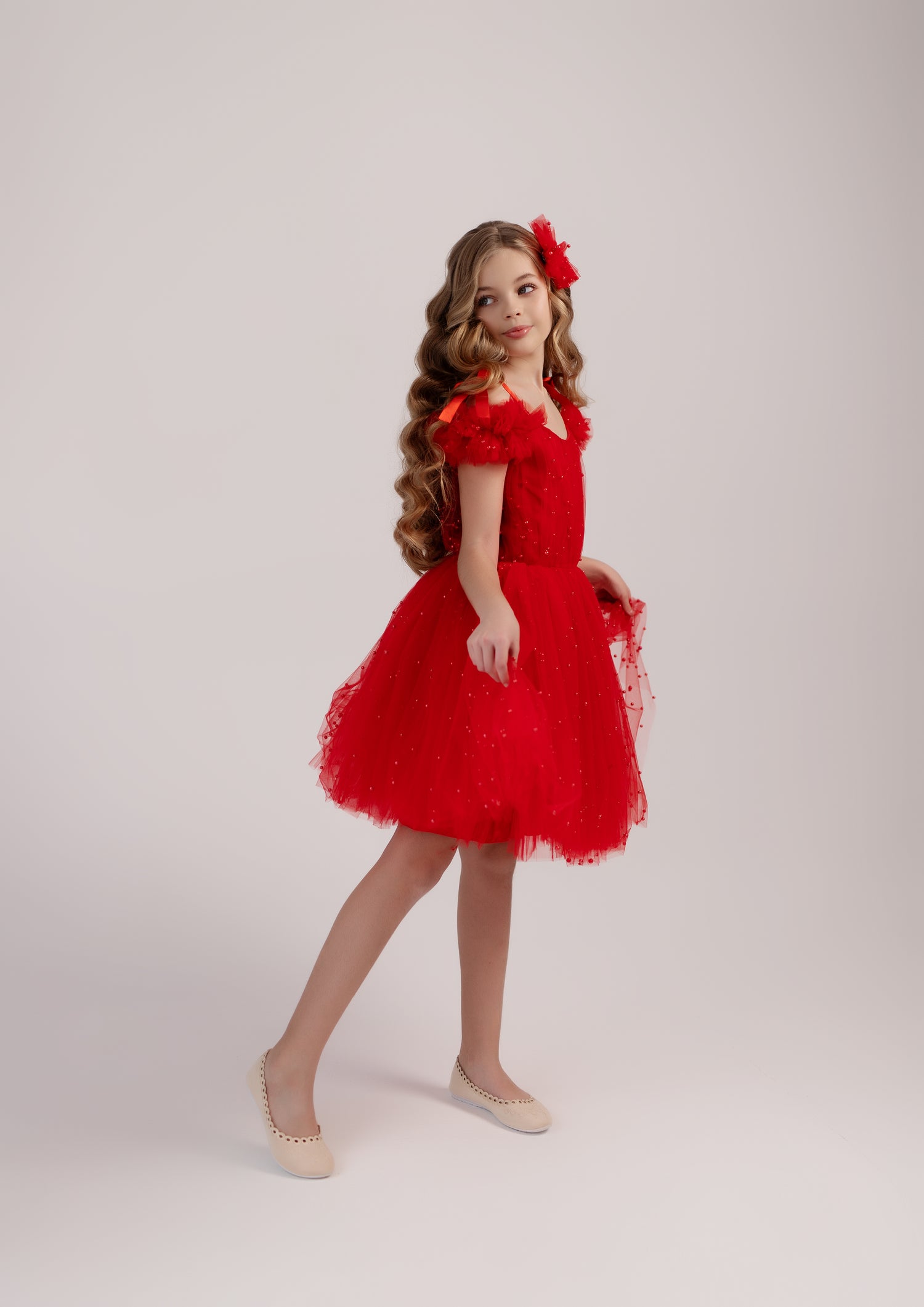 Stylish Christmas dress for girls, featuring an off-shoulder design and red pearl details for a festive look. Baby Girl Dress