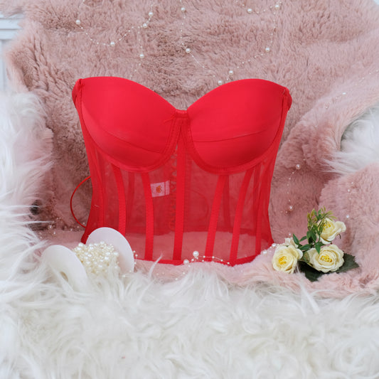 a red bra sitting on top of a fluffy pink chair Baby Girl Dress