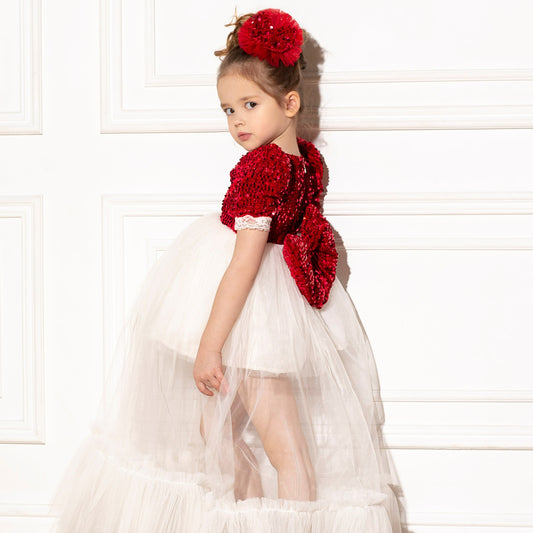 a little girl in a white dress with a red teddy bear Baby Girl Dress