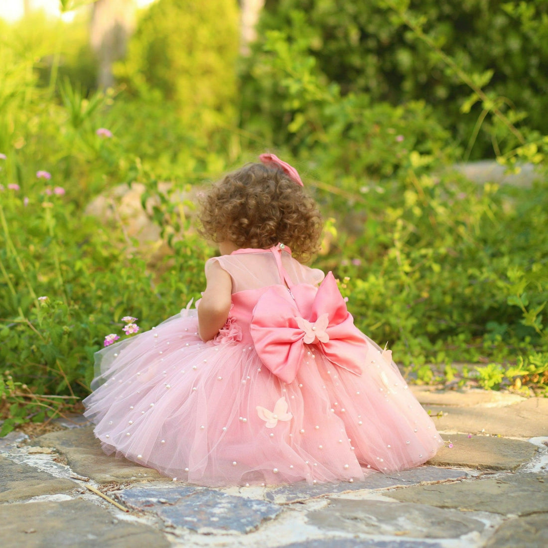 Charming blush Butterfly dress for baby girls, crafted from a blend of cotton, tulle, and satin. Features a lovely butterfly design, ideal for adding elegance to special occasions. Baby Girl Dress for Special Occasion