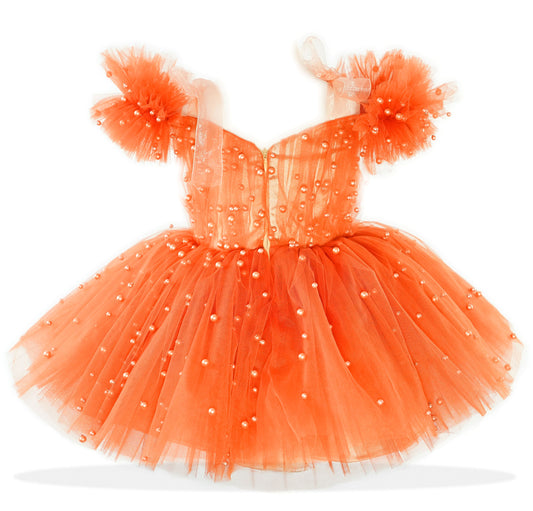 a dress made of tulle and pearls