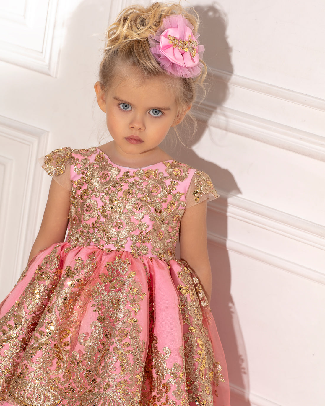a little girl wearing a pink and gold dress Baby Girl Dress for Special Occasion