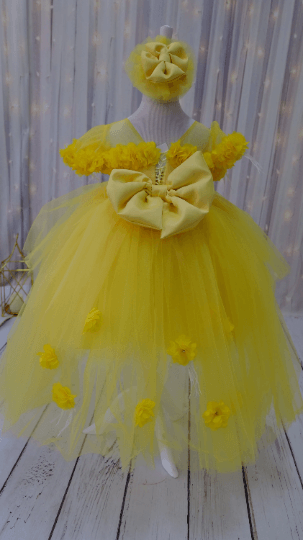a little girl in a yellow dress high low Baby Girl Dress