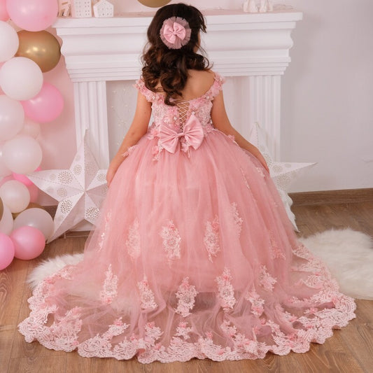Step into your quinceañera in style with this blush gown, designed to make you shine. With its exquisite detailing and flattering silhouette, this dress is perfect for a memorable and magical event. Ideal for creating lasting memories on your special day.
