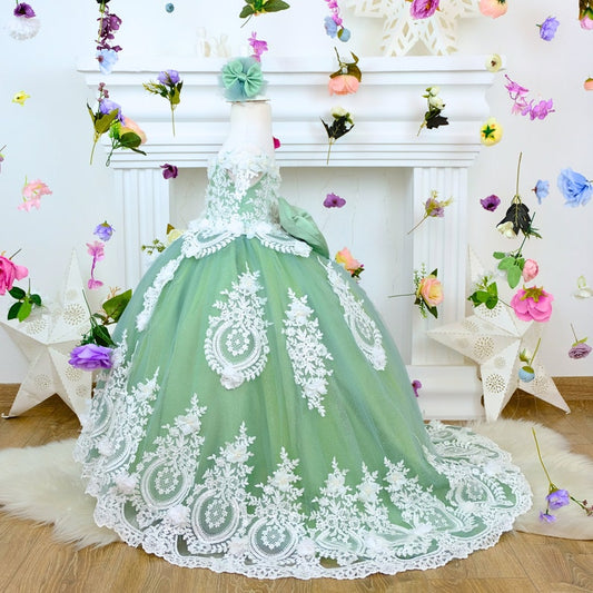 Beautiful sage green Quinceañera dress featuring a graceful design and elegant detailing. The soft sage green color adds a touch of sophistication, making it perfect for a stylish and memorable Quinceañera celebration.