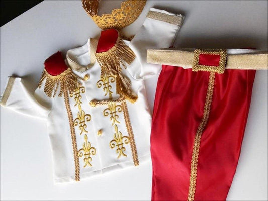Royal-inspired prince red suit set for boys, featuring a tailored jacket with gold accents and matching trousers. Perfect for special occasions or themed events, this set adds a regal touch to any formal attire. Baby Girl Dress