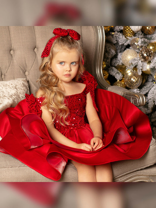 Toddler girl Christmas velvet red satin dress with a sparkly big bow, perfect for the holidays