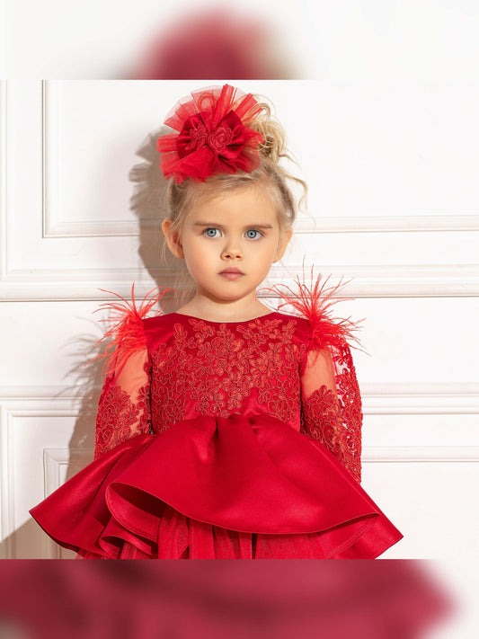 "Mariella red Christmas dress for girls, lace and feather design"
"Red holiday dress with long sleeves for toddler girls"