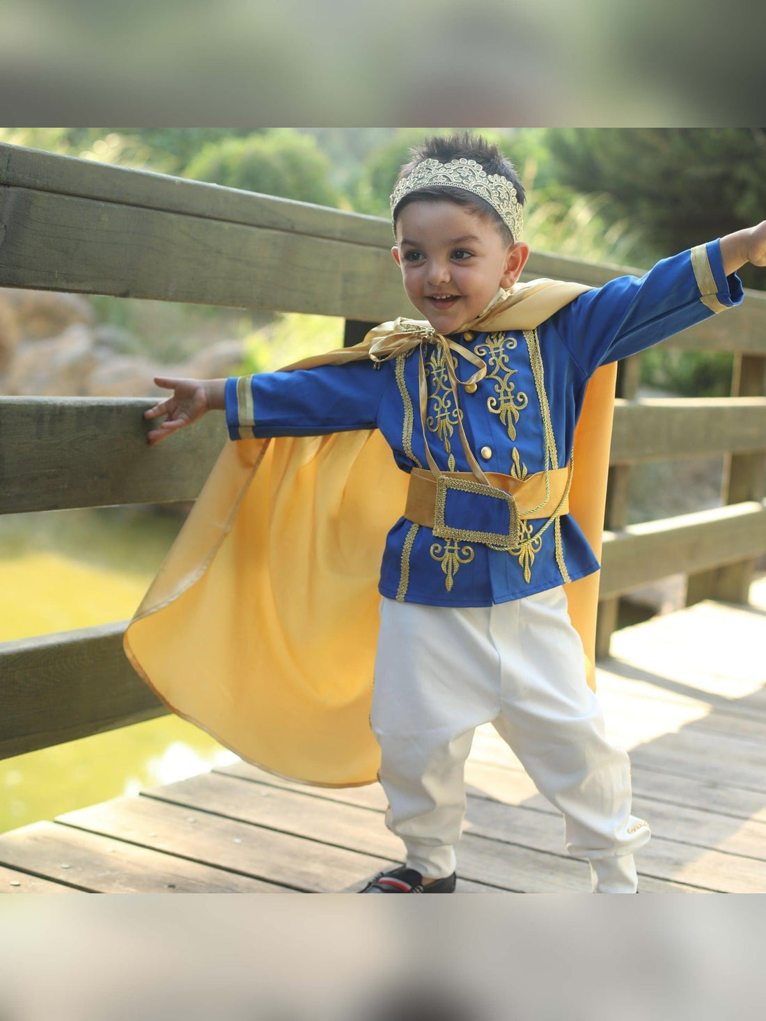 Prince Charming blue costume for boys, featuring a regal blue jacket with gold trim and matching pants. Ideal for costume parties or dress-up play, this outfit captures the classic fairytale look with elegant details.