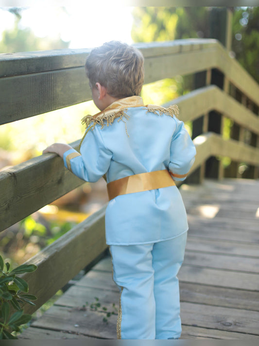 Prince Charming sky blue costume for boys, featuring a light blue jacket with gold detailing and matching pants. Ideal for costume parties or dress-up events, this outfit offers a classic fairytale look with a soft, elegant touch.