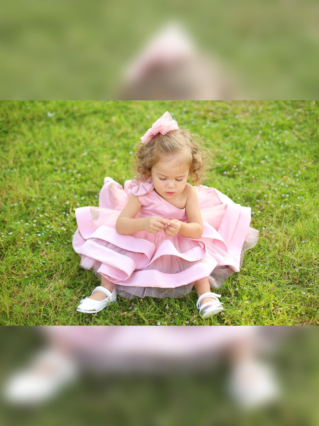 Elegant blush pink one-shoulder dress for girls, featuring a sleek silhouette and a gently draped sleeve. The dress flows gracefully, making it a perfect choice for weddings, parties, or any special occasion.