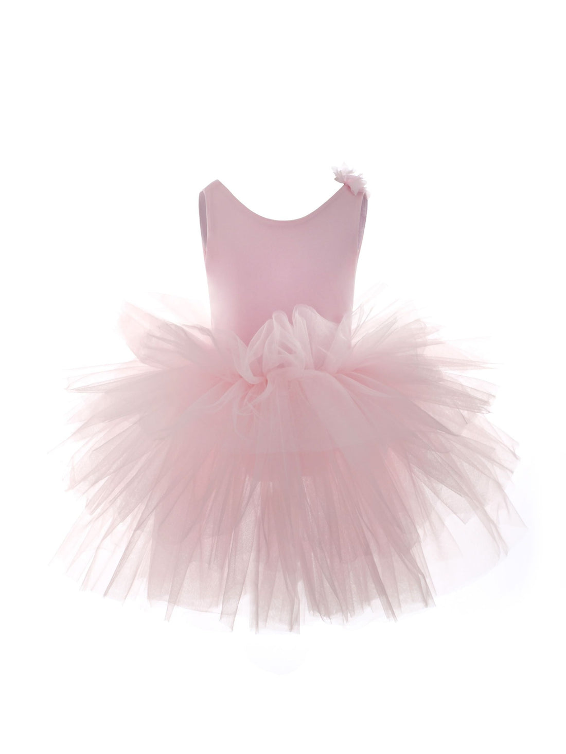 a little girl's pink tutule dress on a white background