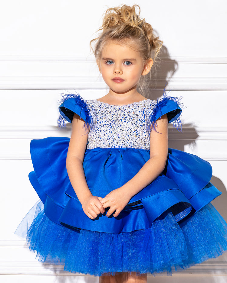 Luxurious royal blue dress for girls featuring soft cotton, layered tulle, satin, and pearl accents.