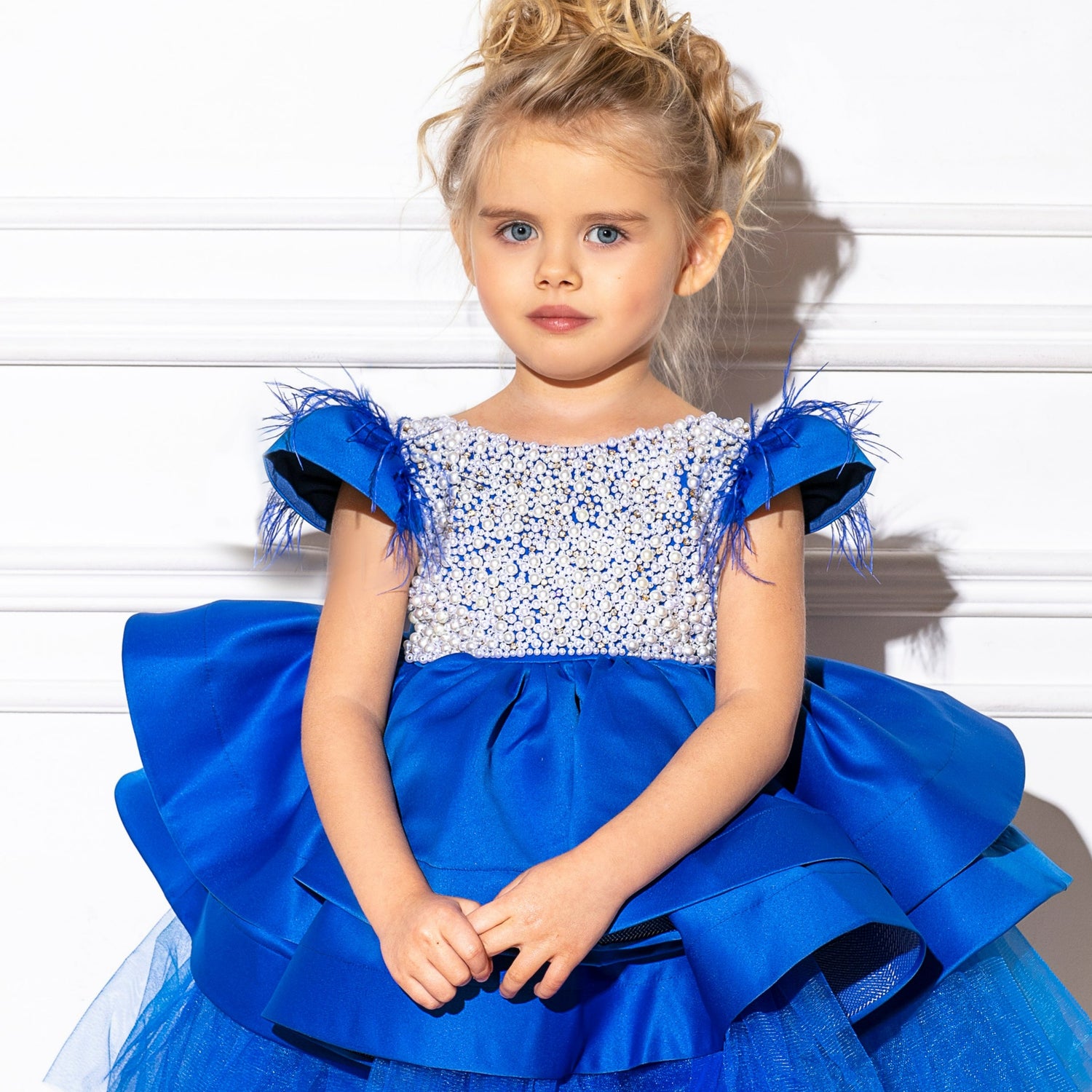 Royal blue girl dress made of cotton, tulle, satin, adorned with pearls, perfect for special occasions.