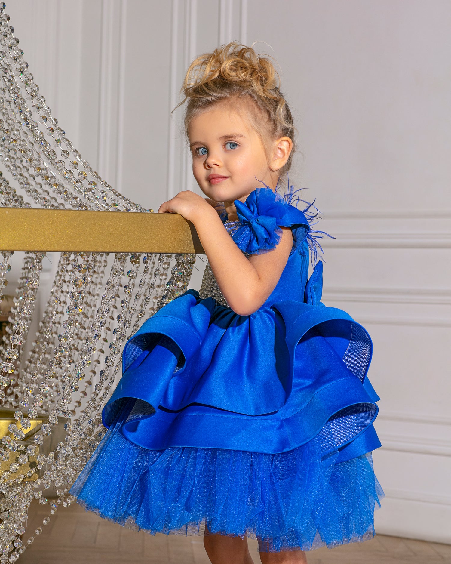 Luxurious royal blue dress for girls featuring soft cotton, layered tulle, satin, and pearl accents.