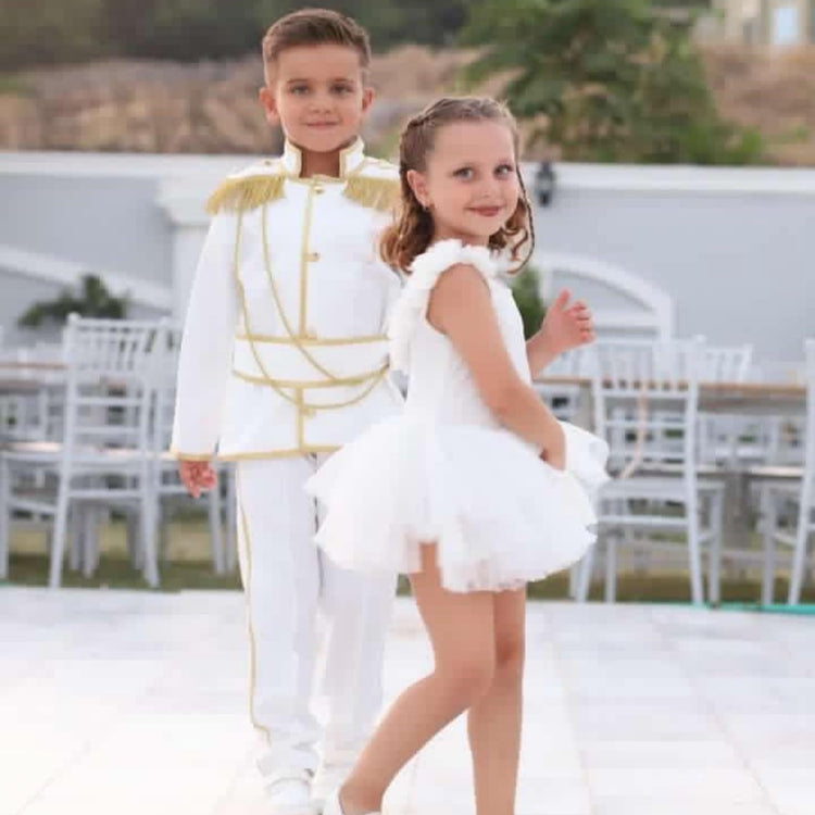 Prince White Charming Suit full front view – A complete formal boys' tuxedo set featuring a tailored white jacket, matching pants, a sleek bow tie, and a stylish vest. Perfect for weddings, baptisms, and other special occasions where elegance and sophistication are a must.