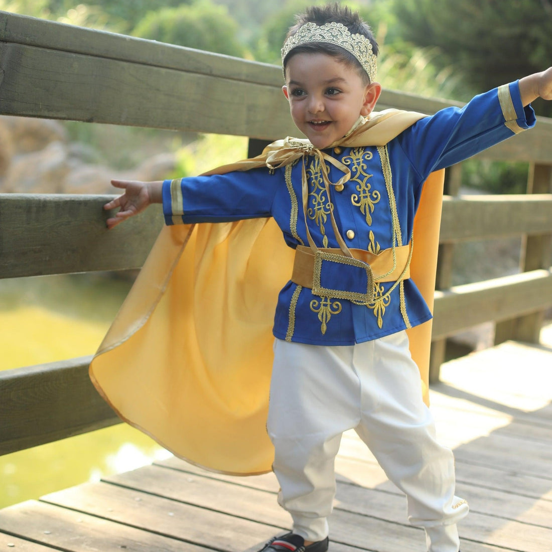 Prince Charming blue costume for boys, featuring a regal blue jacket with gold trim and matching pants. Ideal for costume parties or dress-up play, this outfit captures the classic fairytale look with elegant details. Baby Girl Dress for Special Occasion