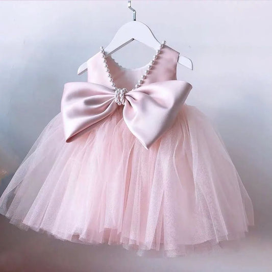 Comfortable flower girl dress with open back and elegant bow, perfect for weddings and special occasions