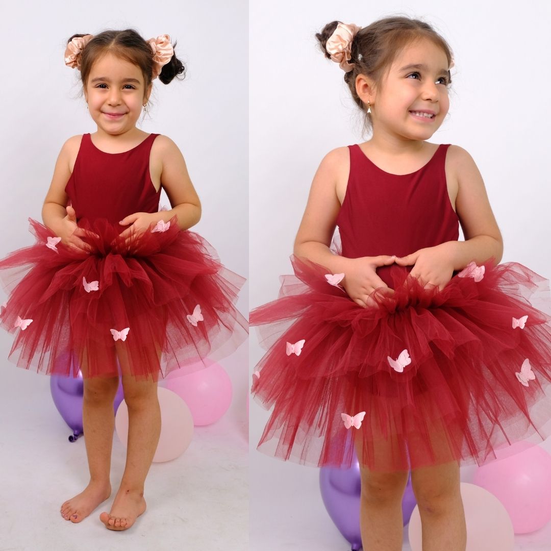 two pictures of a little girl wearing a red dress