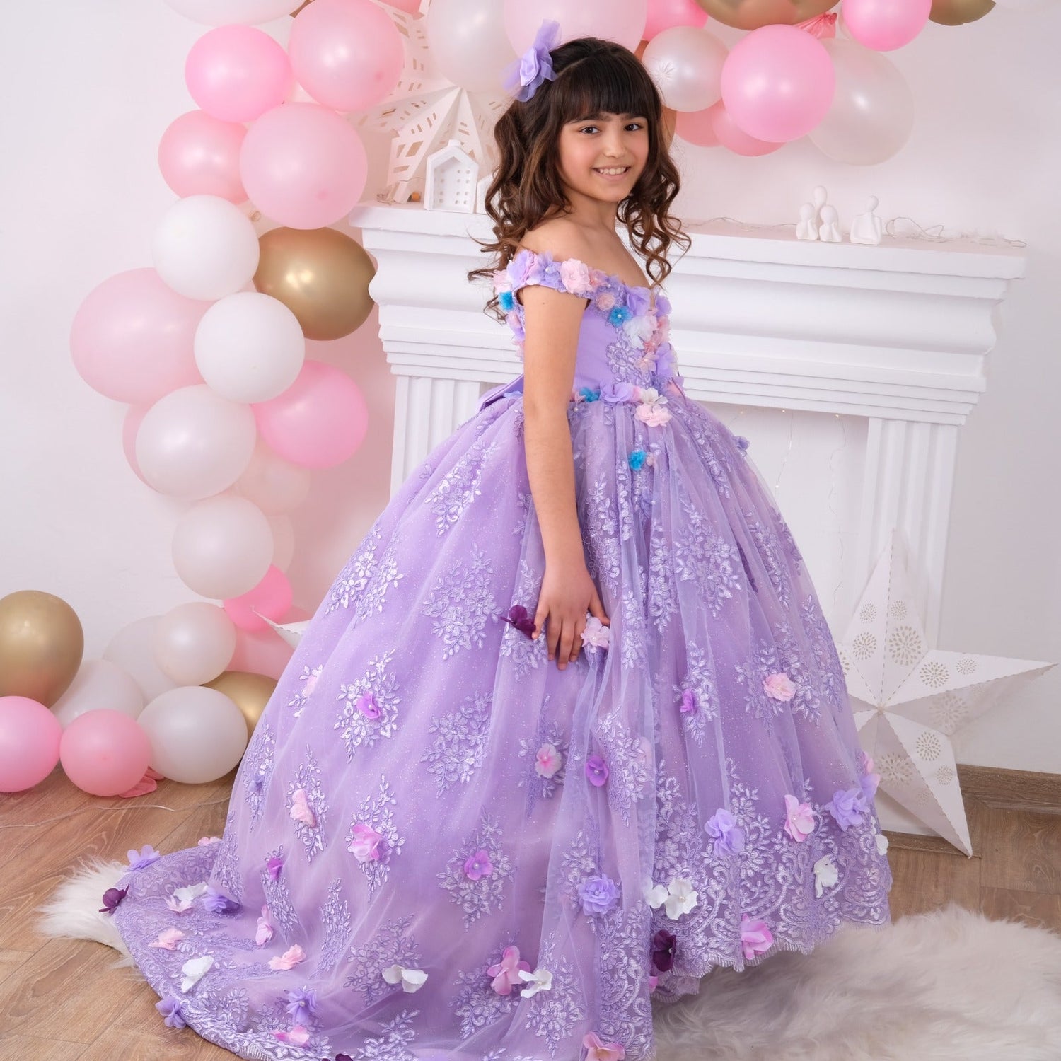 Lilac Quinceañera dress with elegant design and detailed embellishments, perfect for celebrating special occasions. Features a flowing skirt and sophisticated detailing, ideal for a memorable celebration.