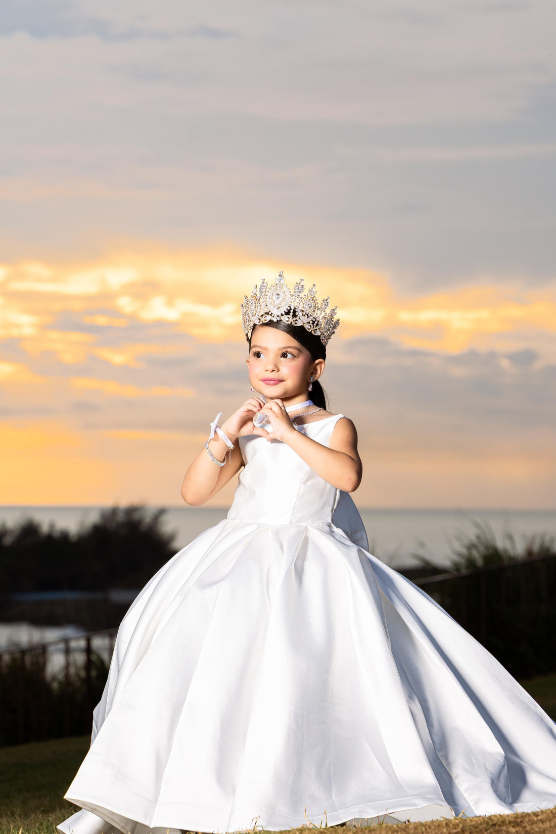 Girl wearing white satin flower girl dress outdoors
Size chart for girls satin ball gown sizes 2 to 14 Baby Girl Dress for Special Occasion