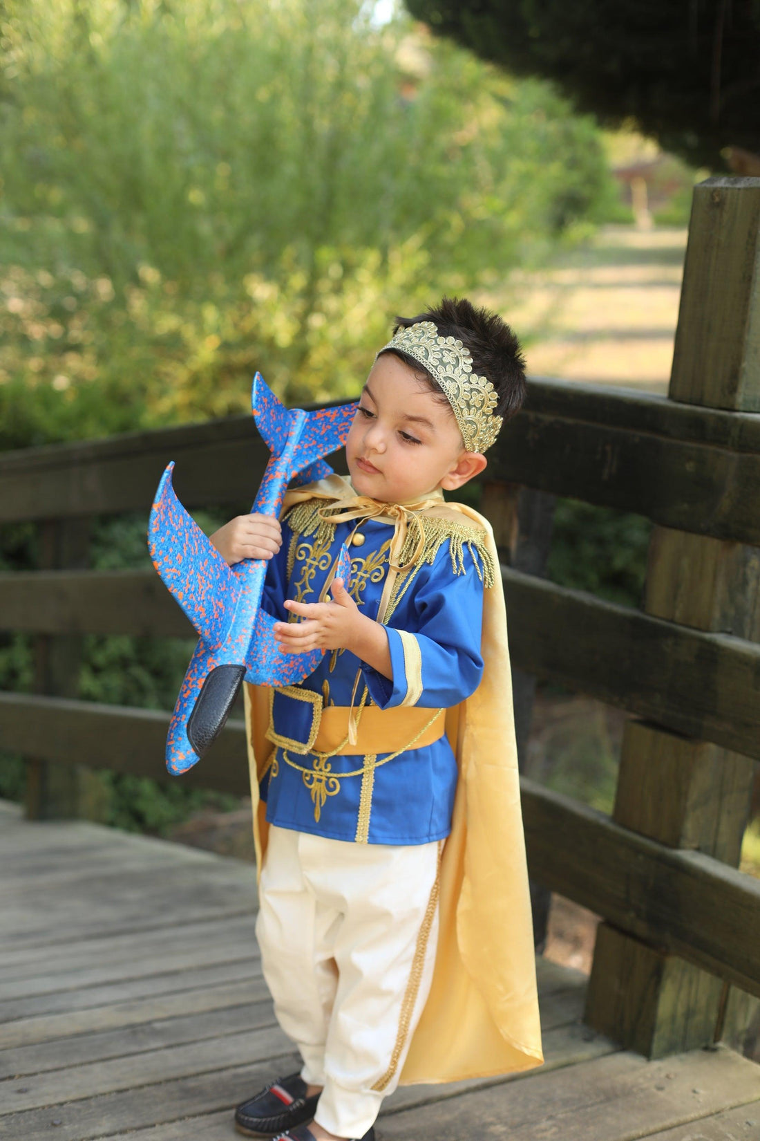 Prince Charming blue costume for boys, featuring a regal blue jacket with gold trim and matching pants. Ideal for costume parties or dress-up play, this outfit captures the classic fairytale look with elegant details. Baby Girl Dress for Special Occasion