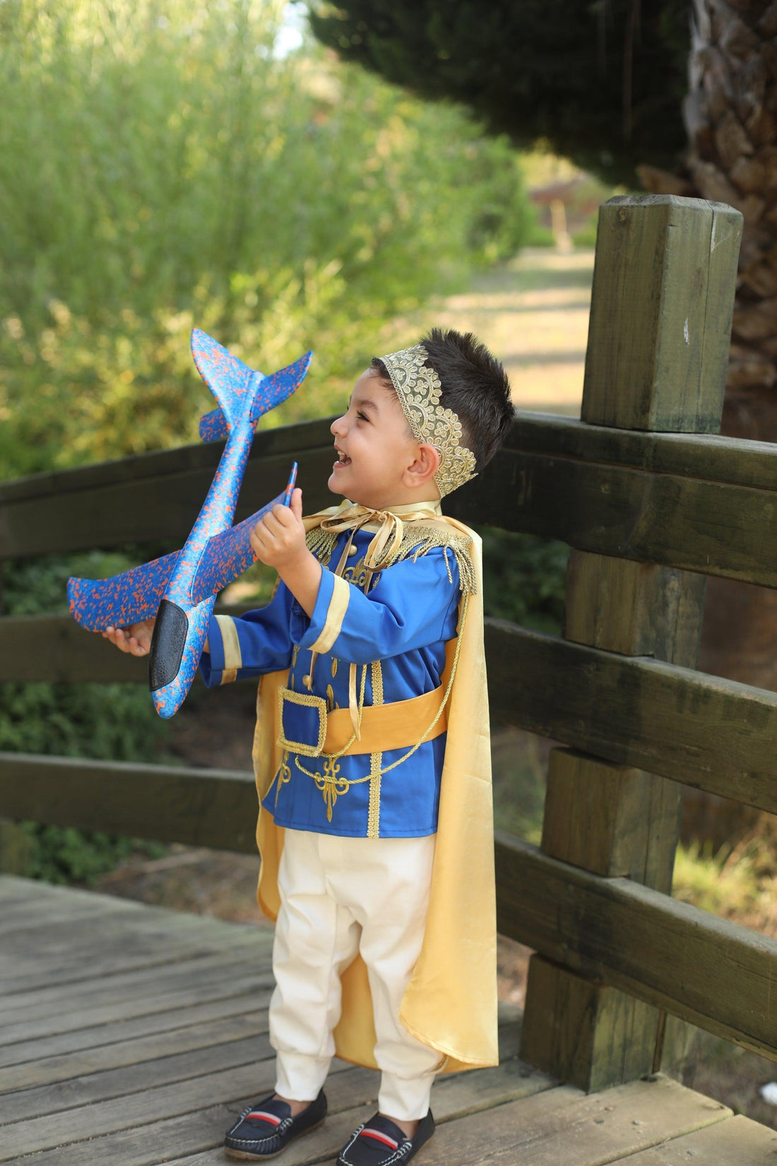 Prince Charming blue costume for boys, featuring a regal blue jacket with gold trim and matching pants. Ideal for costume parties or dress-up play, this outfit captures the classic fairytale look with elegant details. Baby Girl Dress for Special Occasion