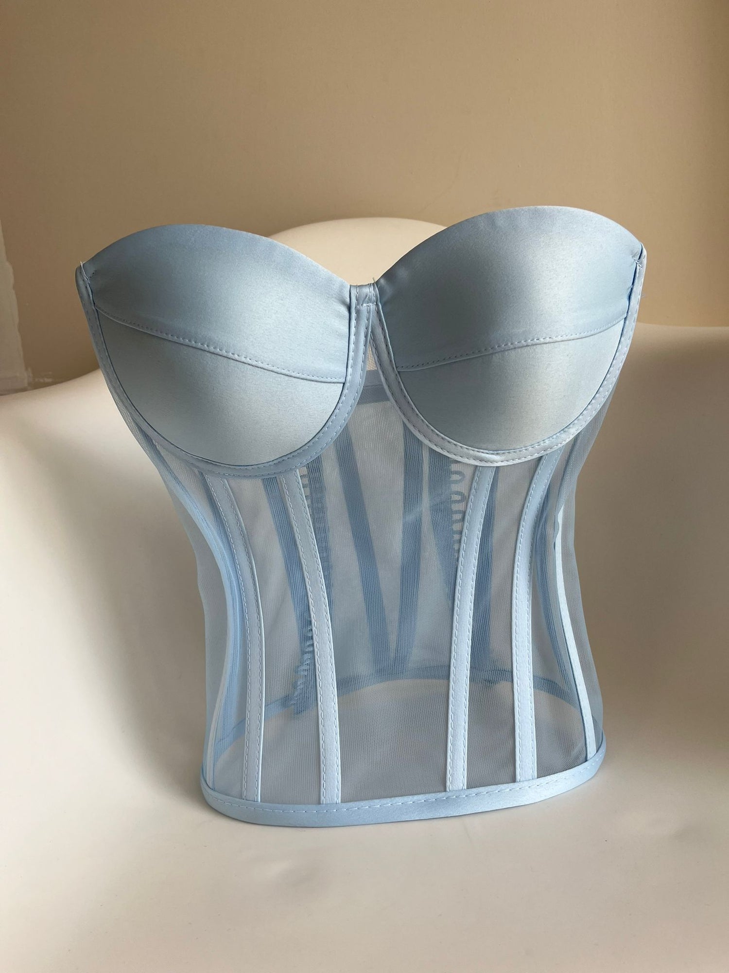 a close up of a bra on a chair