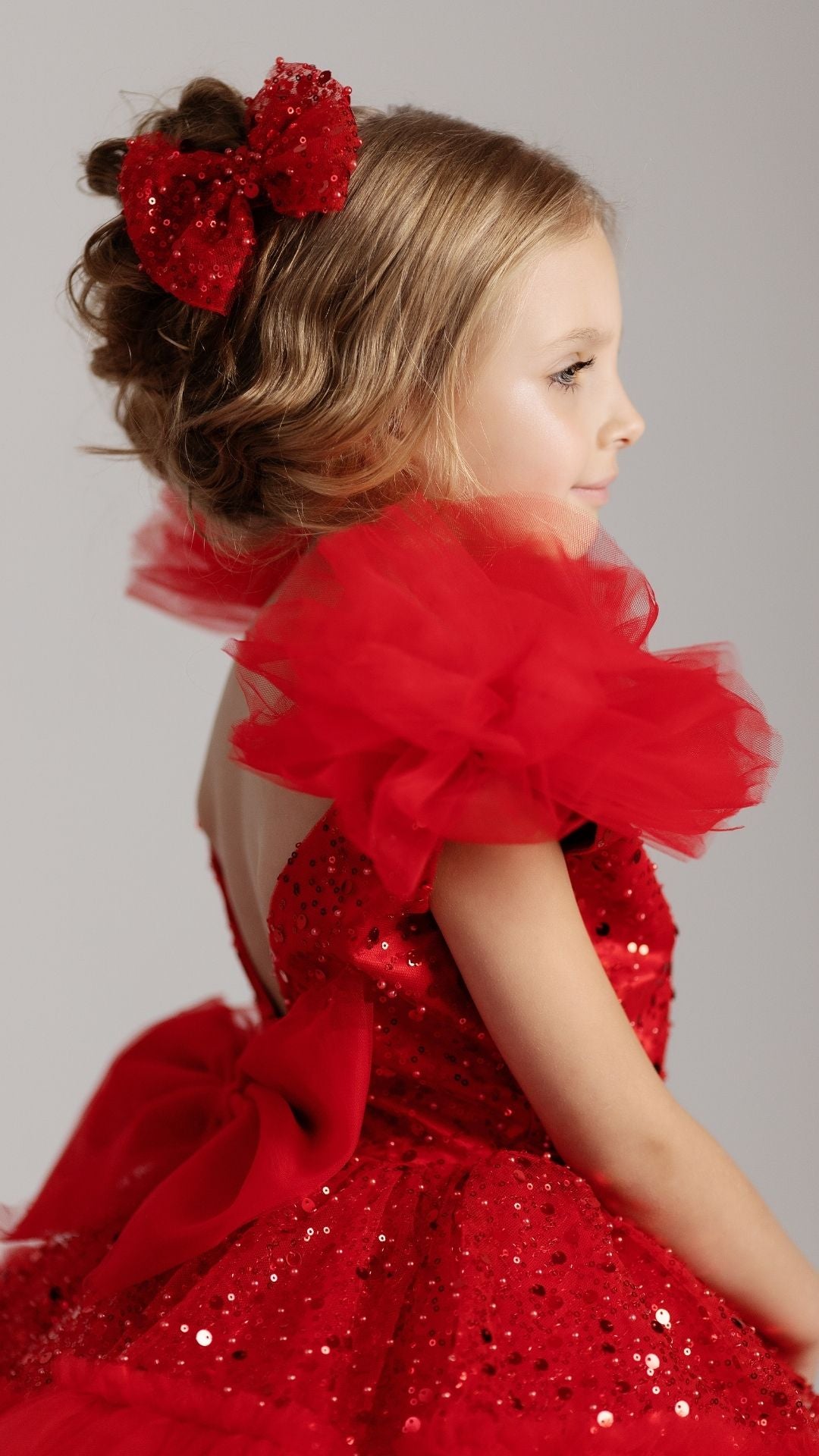 a little girl in a red dress with a flower in her hair Baby Girl Dress