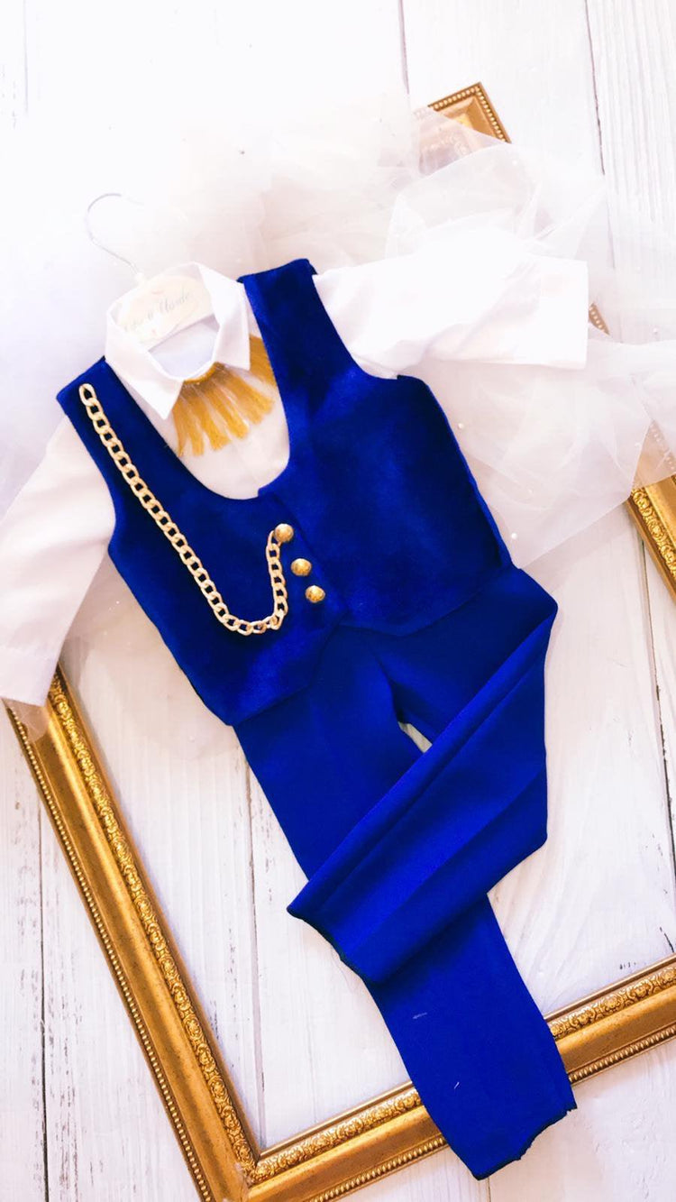 Adorable baby boy jumpsuit in royal blue, featuring a comfortable and stylish design. Perfect for everyday wear or special occasions, this jumpsuit offers a vibrant color and a cozy fit for your little one.