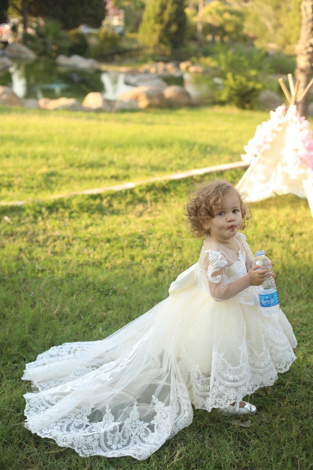 White long baptism and flower girl dress made from cotton, tulle, satin, and lace, perfect for special occasions like weddings and baptisms