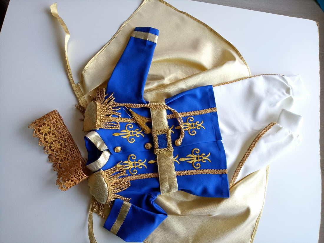 Prince Charming blue costume for boys, featuring a regal blue jacket with gold trim and matching pants. Ideal for costume parties or dress-up play, this outfit captures the classic fairytale look with elegant details. Baby Girl Dress for Special Occasion